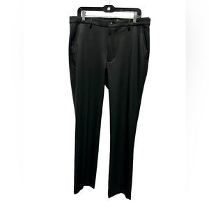 Greg Norman , golf slacks , black 34-34